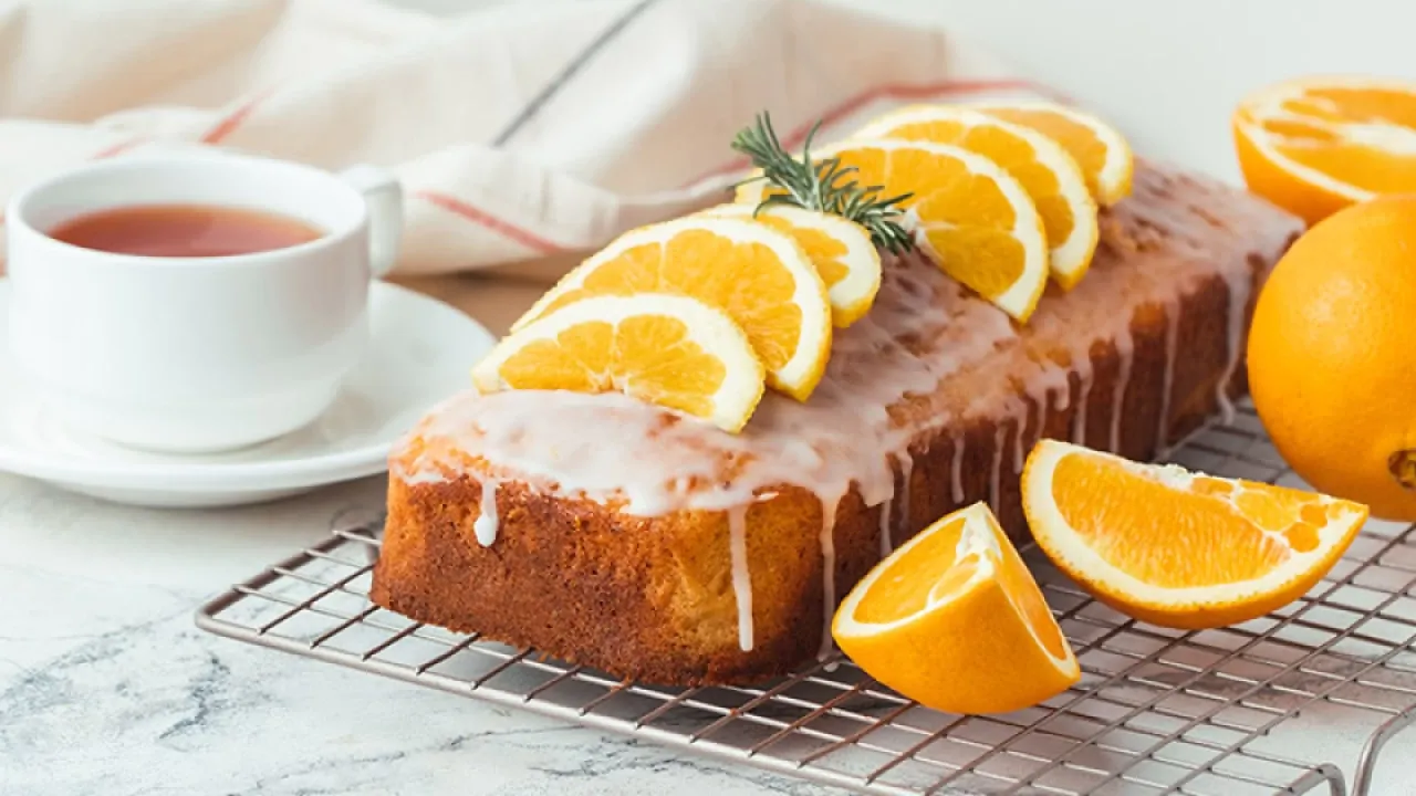 طرز تهیه کیک پرتقالی با ماست خانگی3